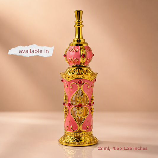 A decorative perfume bottle with a pink and gold design, featuring ornate filigree patterns and red jewel accents, shown on a neutral beige background with text overlays indicating size and availability.