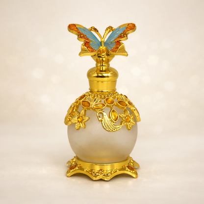 15 ml decorative fancy attar bottle with jewels and blue turquoise butterfly holding vegan cruelty free no alcohol perfume oil