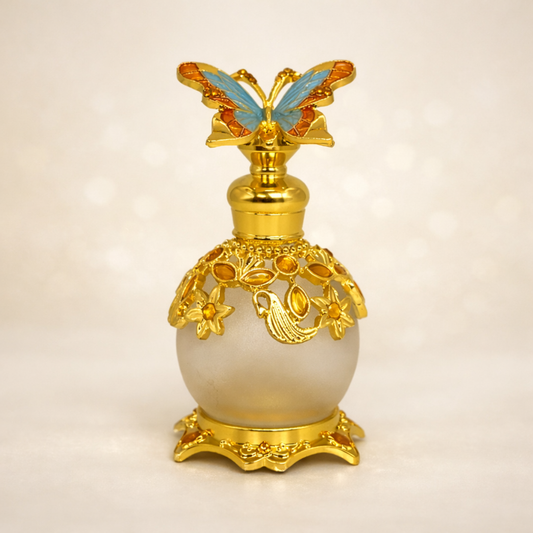 15 ml decorative fancy attar bottle with jewels and blue turquoise butterfly holding vegan cruelty free no alcohol perfume oil